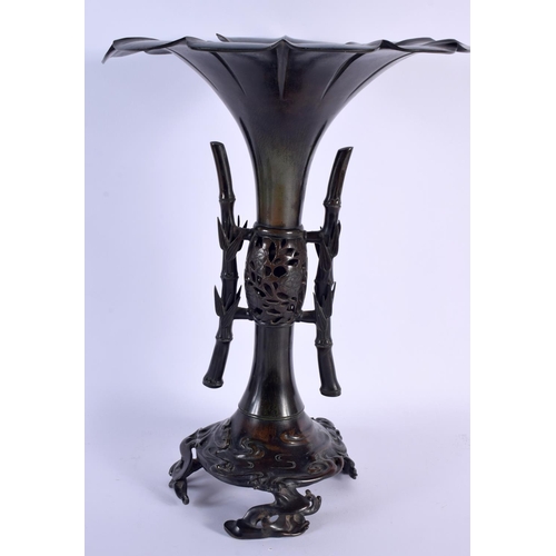 1665 - A FINE AND RARE 19TH CENTURY JAPANESE MEIJI PERIOD TWIN HANDLED BRONZE VASE with open work body, upo... 