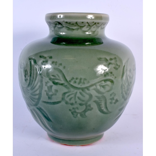 1672 - AN EARLY 20TH CENTURY CHINESE KOREAN CELADON INCISED JAR decorated with birds and flowers. 18 cm x 1... 