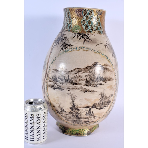 1674 - A LARGE 19TH CENTURY JAPANESE MEIJI PERIOD SATSUMA VASE painted with figures in landscapes. 38 cm x ... 