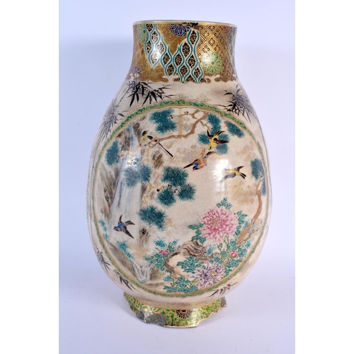 1674 - A LARGE 19TH CENTURY JAPANESE MEIJI PERIOD SATSUMA VASE painted with figures in landscapes. 38 cm x ... 