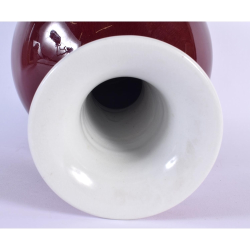 1676 - A CHINESE SANG DU BOEUF PORCELAIN VASE 20th Century. 32 cm x 16 cm.