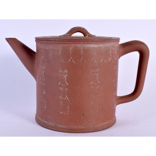 1679 - A CHINESE QING DYNASTY YIXING POTTERY TEAPOT AND COVER decorated all over with calligraphy. 15 cm wi... 