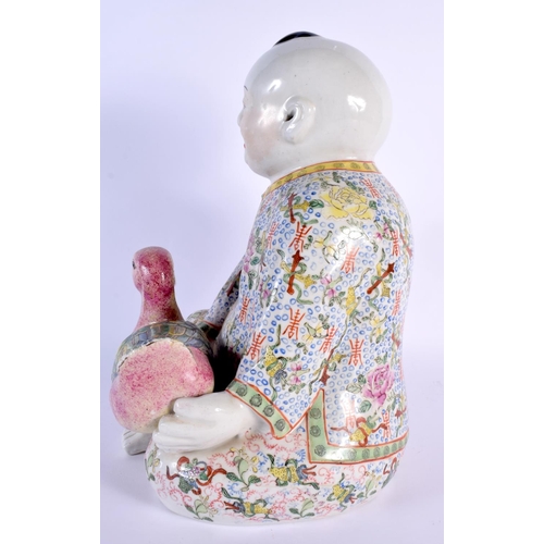 1692 - A LARGE EARLY 20TH CENTURY CHINESE FAMILLE ROSE PORCELAIN FIGURE OF A BOY Late Qing/Republic, modell... 