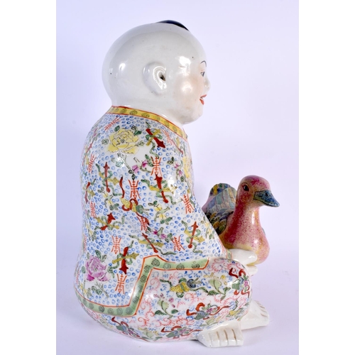 1692 - A LARGE EARLY 20TH CENTURY CHINESE FAMILLE ROSE PORCELAIN FIGURE OF A BOY Late Qing/Republic, modell... 