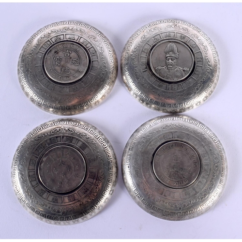 1703 - THREE CHINESE WHITE METAL COIN DISHES 20th Century. 438 grams. 9 cm diameter. (3)