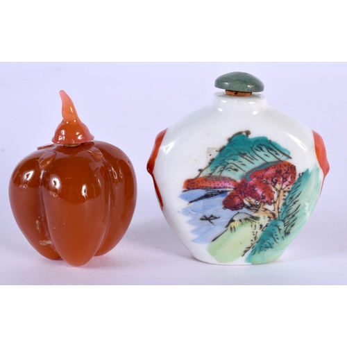 1710 - A CHINESE CARVED AGATE SNUFF BOTTLE 20th Century, together with another. Largest 6 cm x 5.75 cm. (2)