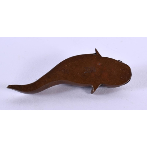 1713 - A JAPANESE CATFISH OKIMONO. 38 grams. 5.75 cm x 2.25 cm.