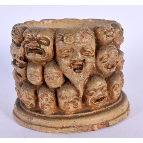 1728 - AN UNUSUAL 19TH CENTURY JAPANESE MEIJI PERIOD POTTERY BOX decorated with faces. 9 cm x 7 cm.