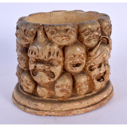 1728 - AN UNUSUAL 19TH CENTURY JAPANESE MEIJI PERIOD POTTERY BOX decorated with faces. 9 cm x 7 cm.