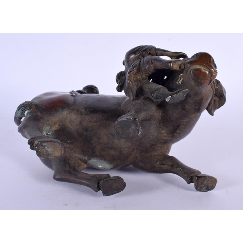 1733 - A CHINESE BRONZE FIGURE OF A BUFFALO 20th Century. 14 cm x 14 cm.