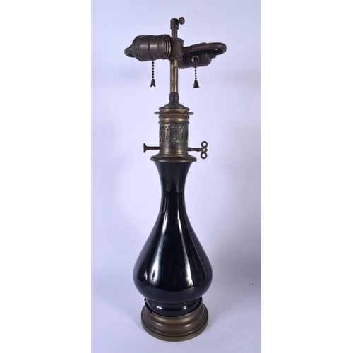 1737 - A 19TH CENTURY CHINESE MONOCHROME BLACK GLAZED LAMP modelled in the Yongzheng manner. 48 cm high.