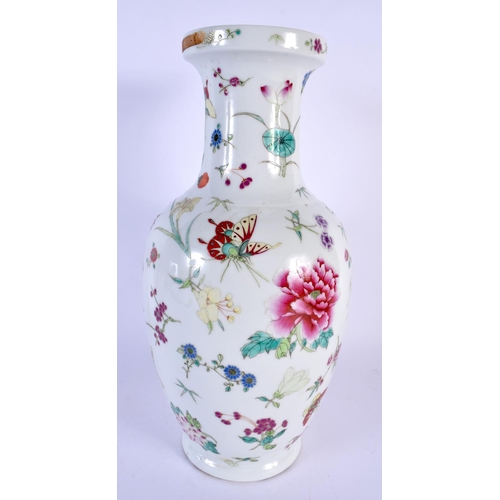 1739 - A CHINESE REPUBLICAN PERIOD FAMILLE ROSE PORCELAIN VASE painted with flowers. 30 cm high.