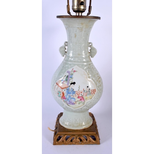 1740 - A RARE 19TH CENTURY CHINESE TWIN HANDLED CELADON FAMILLE ROSE LAMP Qing, painted with figures. 54 cm... 