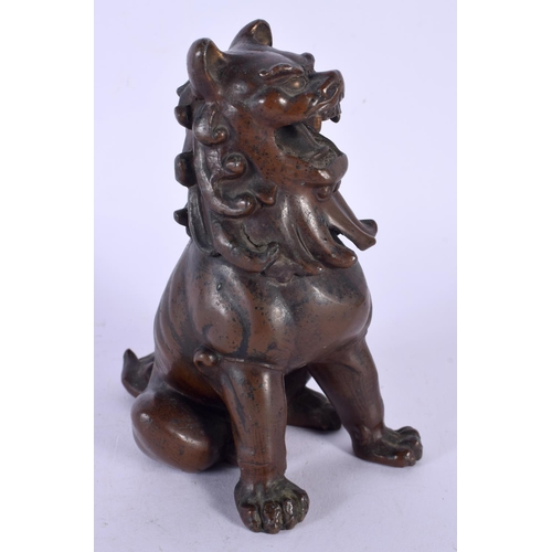 1751 - A 19TH CENTURY JAPANESE MEIJI PERIOD BRONZE FIGURE OF A BEAST modelled scowling. 13 cm x 8 cm.