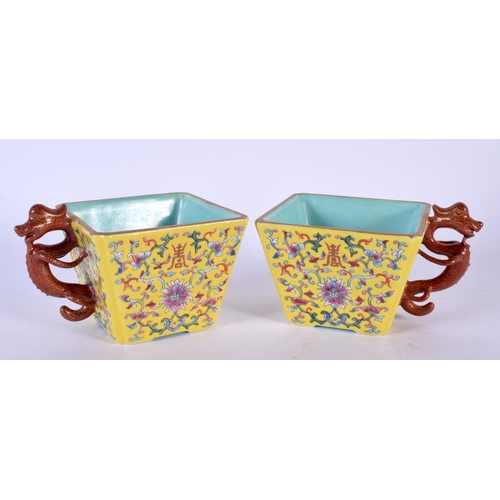 1755 - A RARE PAIR OF EARLY 20TH CENTURY CHINESE FAMILLE JAUNE CUPS Late Qing/Republic, painted with foliag... 