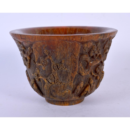 1757 - A CHINESE CARVED BUFFALO HORN TYPE LIBATION CUP 20th Century. 383 grams. 12 cm wide.