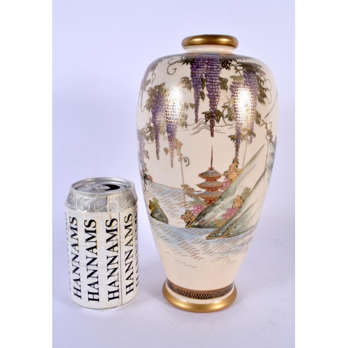 1760 - AN EARLY 20TH CENTURY JAPANESE MEIJI PERIOD SATSUMA VASE painted with landscapes. 26 cm high.