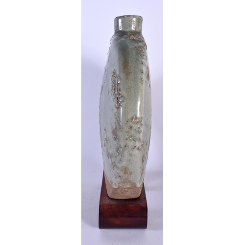 1785 - AN UNUSUAL EARLY 20TH CENTURY CHINESE KOREAN MOON FLASK with natural glaze pitting. 30 cm x 20 cm.