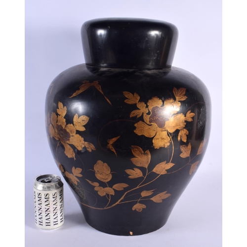 1800 - A LARGE 19TH CENTURY JAPANESE MEIJI PERIOD BLACK LACQUER JAR AND COVER decorated with foliage. 46 cm... 