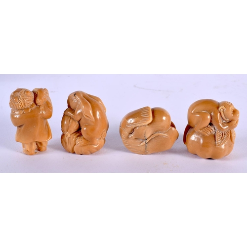 1808 - FOUR JAPANESE CARVED TAGHUA NUT NETSUKES. 90 grams. 4 cm x 3.25 cm. (4)