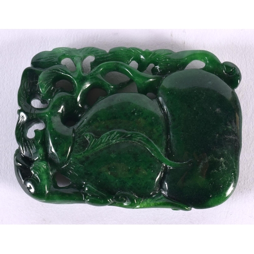 1811 - A CHINESE GREEN JADE PENDANT 20th Century. 68 grams. 7.25 cm x 5.25 cm.