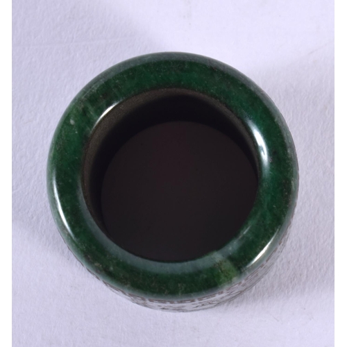 1816 - A CHINESE CARVED JADE ARCHERS RING 20th Century. 37 grams. 4 cm wide.