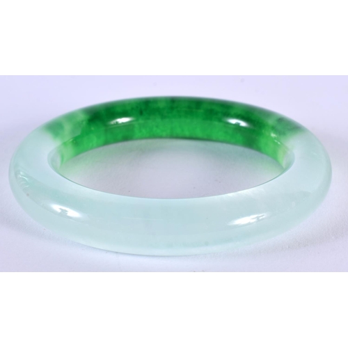 1820 - A CHINESE TWO TONE JADE BANGLE 20th Century. 79 grams. 6 cm wide.