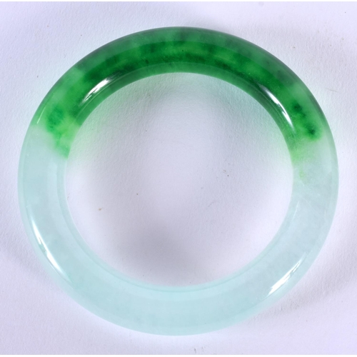 1820 - A CHINESE TWO TONE JADE BANGLE 20th Century. 79 grams. 6 cm wide.