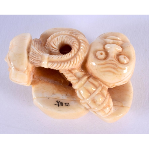 1825 - A JAPANESE CARVED BONE MASK NETSUKE. 39 grams. 5 cm x 3.5 cm.