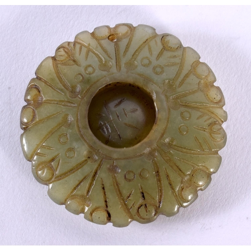 1835 - A 19TH CENTURY CHINESE CARVED MUTTON JADE ROUNDEL Qing. 34 grams. 5 cm x 1 cm.