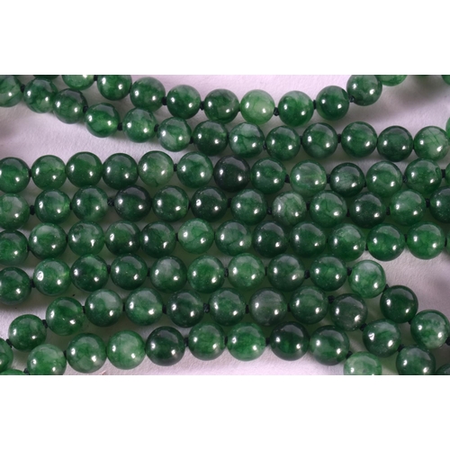 1839 - A CHINESE CARVED GREEN JADE NECKLACE 20th Century. 99 grams. 131 cm long.