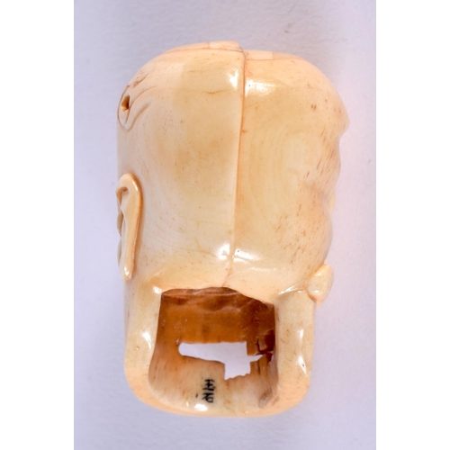 1852 - A JAPANESE CARVED BONE SKULL NETSUKE. 52 grams. 5.5 cm x 3.5 cm.