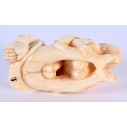 1854 - A JAPANESE CARVED BONE NETSUKE. 36 grams. 5.5 cm x 3 cm.