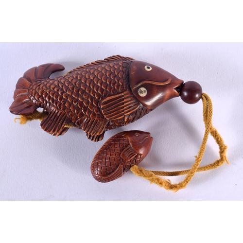 1855 - A JAPANESE CARVED BOXWOOD FISH INRO AND COVER. 12.5 cm x 5.25 cm.