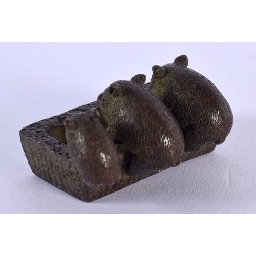 1857 - A JAPANESE BRONZE PIG TROUGH OKIMONO. 101 grams. 4.5 cm x 3.5 cm.