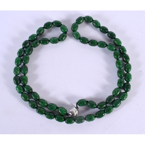 1858 - AN 18CT GOLD MOUNTED CHINESE GOLD AND DIAMOND JADE BEADS. 183 grams. 100 cm long.