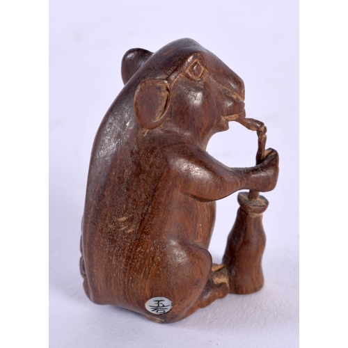 1861 - A JAPANESE CARVED BOXWOOD RABBIT NETSUKE. 21 grams. 4.5 cm x 3.5 cm.