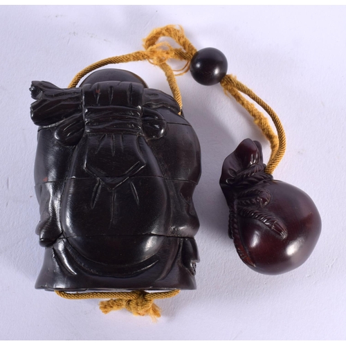 1864 - A JAPANESE CARVED BOXWOOD INRO in the form of a buddha. 8.5 cm x 6 cm.