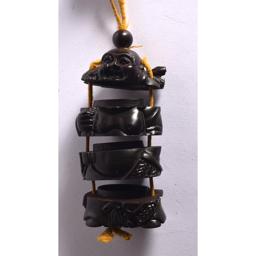 1864 - A JAPANESE CARVED BOXWOOD INRO in the form of a buddha. 8.5 cm x 6 cm.