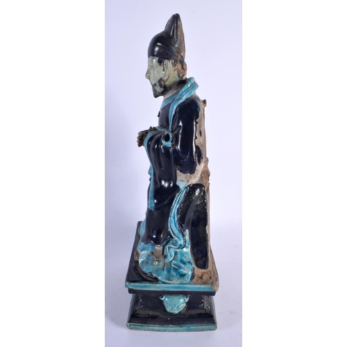 1873 - A RARE LARGE 16TH/17TH CENTURY CHINESE FAHUA POTTERY FIGURE OF AN IMMORTAL Ming/Qing, modelled with ... 