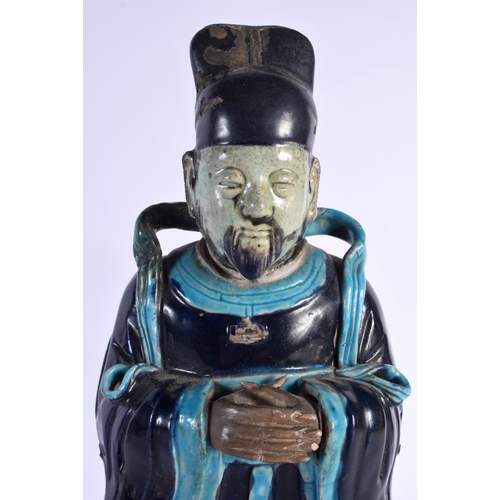 1873 - A RARE LARGE 16TH/17TH CENTURY CHINESE FAHUA POTTERY FIGURE OF AN IMMORTAL Ming/Qing, modelled with ... 