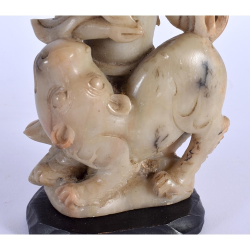 1874 - AN 18TH CENTURY CHINESE CARVED SOAPSTONE FIGURE OF A MALE AND BEAST Qianlong/Jiaqing, together with ... 