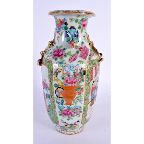 1879 - A RARE 19TH CENTURY CHINESE CANTON FAMILLE ROSE PORCELAIN VASE Qing, with highly unusual upturned bi... 