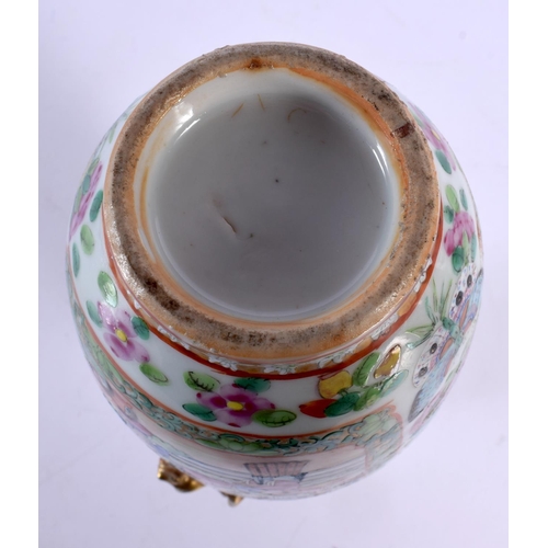 1879 - A RARE 19TH CENTURY CHINESE CANTON FAMILLE ROSE PORCELAIN VASE Qing, with highly unusual upturned bi... 