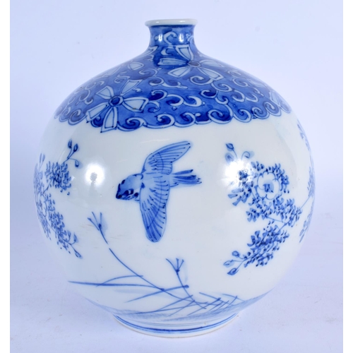 1887 - A 19TH CENTURY JAPANESE MEIJI PERIOD BLUE AND WHITE BULBOUS VASE painted with birds. 18 cm x 12 cm.