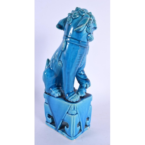 1899 - A 19TH CENTURY CHINESE TURQUOISE GLAZED PORCELAIN DOG OF FOE Qing. 25 cm high.