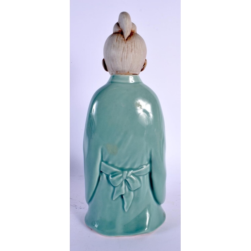 1900 - AN UNUSUAL EARLY 20TH CENTURY JAPANESE TAISHO PERIOD CELADON PORCELAIN FIGURE modelled as a young bo... 