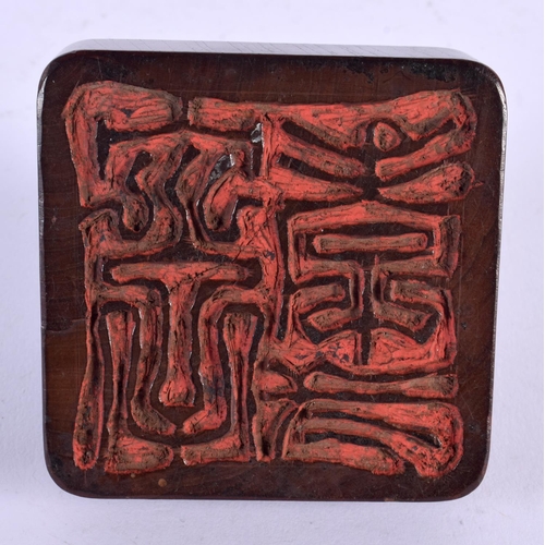 1909 - A VERY UNUSUAL 19TH CENTURY CHINESE CARVED HARDWOOD SEAL Qing, possibly Zitan, modelled as a seated ... 