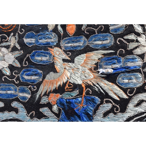 1910 - A 19TH CENTURY CHINESE SILKWORK EMBROIDERED DOUBLE RANK BADGE depicting birds amongst foliage. 48 cm... 