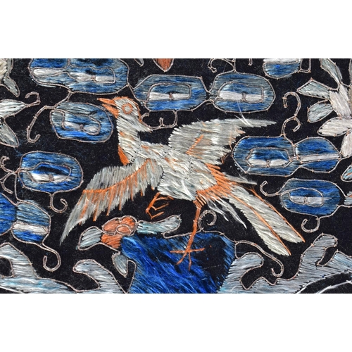 1910 - A 19TH CENTURY CHINESE SILKWORK EMBROIDERED DOUBLE RANK BADGE depicting birds amongst foliage. 48 cm... 